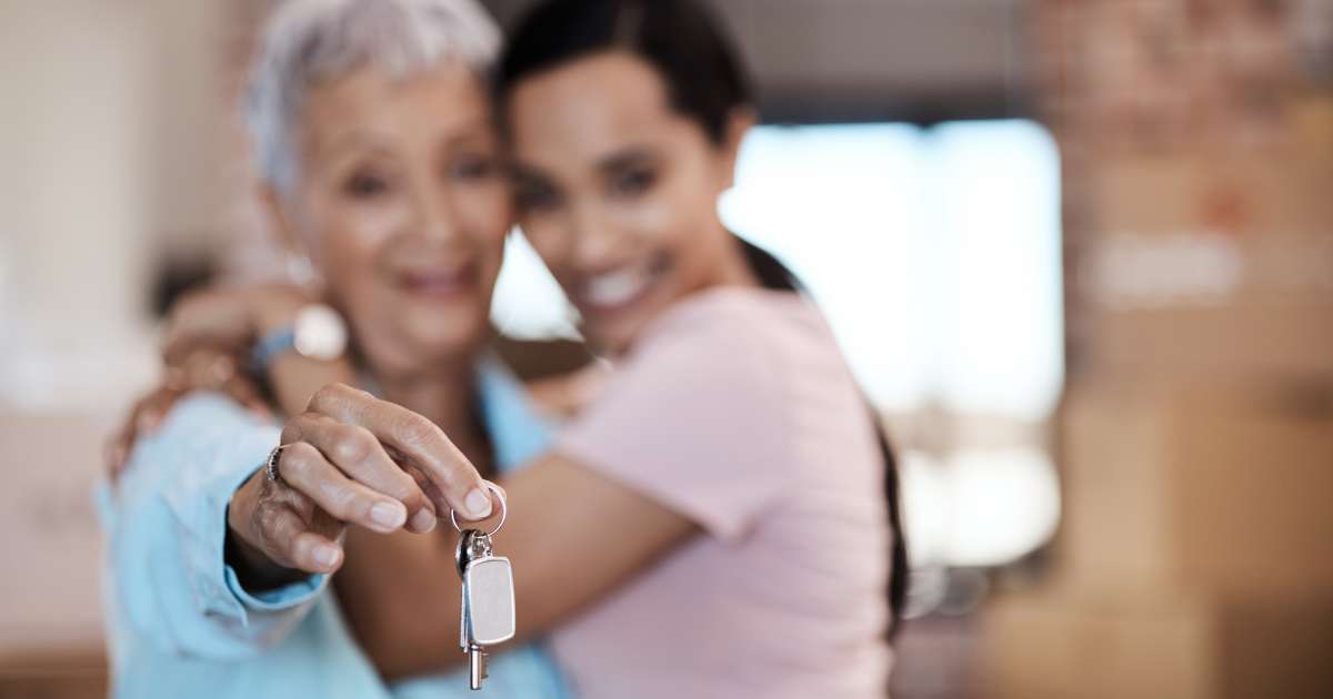 two women with house key